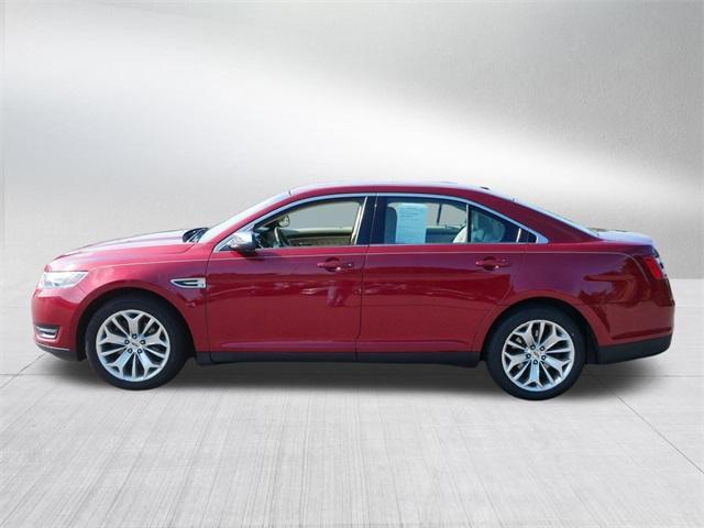 Photo of 2017 Ruby Red Metallic Tinted Clearcoat Ford Taurus