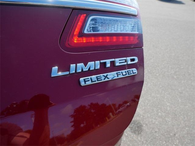 Photo of 2017 Ruby Red Metallic Tinted Clearcoat Ford Taurus