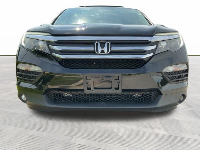 Photo of 2016 Crystal Black Pearl Honda Pilot