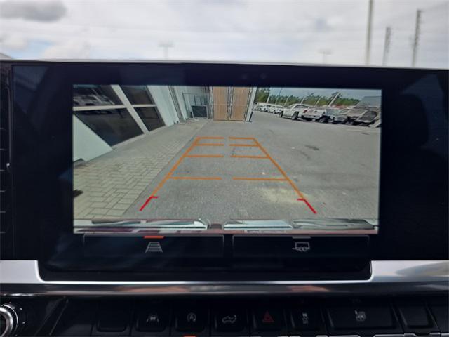 Photo of 2024 Volcanic Red Tintcoat GMC Sierra 1500