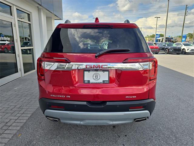 Photo of 2023 Volcanic Red Tintcoat GMC Acadia