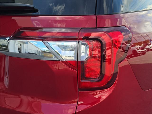 Photo of 2023 Volcanic Red Tintcoat GMC Acadia
