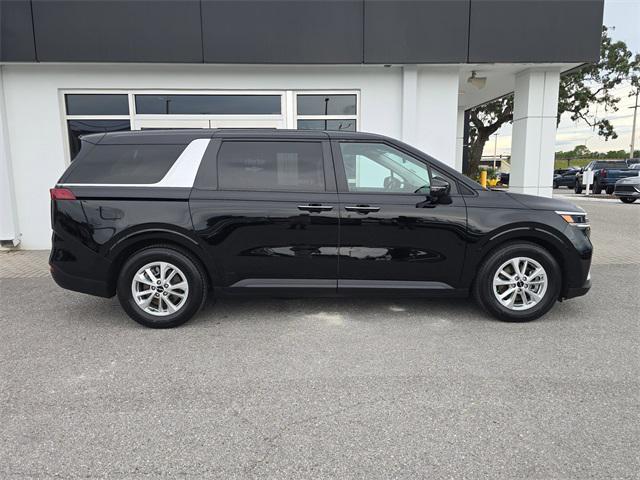 Photo of 2023 Aurora Black Pearl Kia Carnival