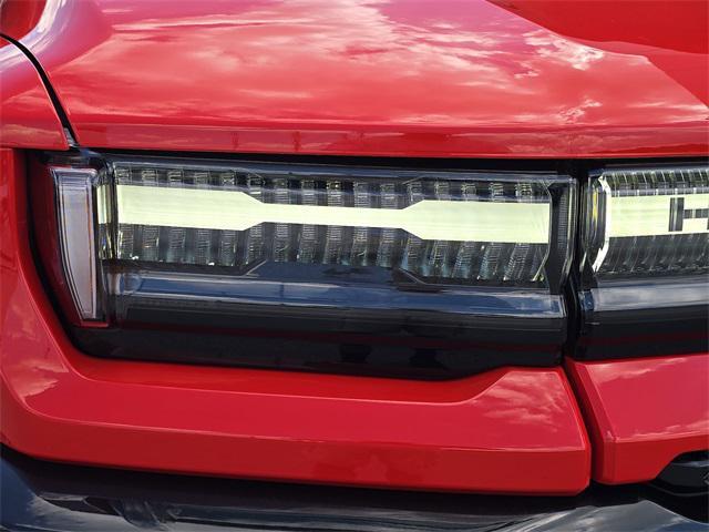 Photo of 2025 Solar Orange GMC HUMMER EV Pickup