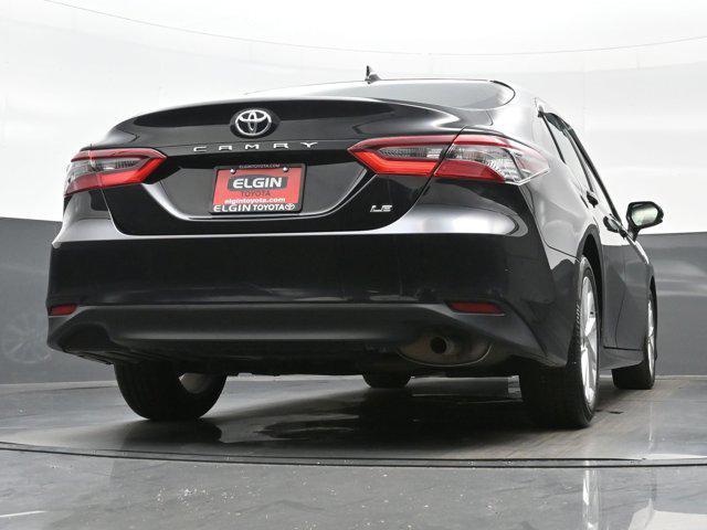 Photo of 2024 Midnight Black Metallic Toyota Camry
