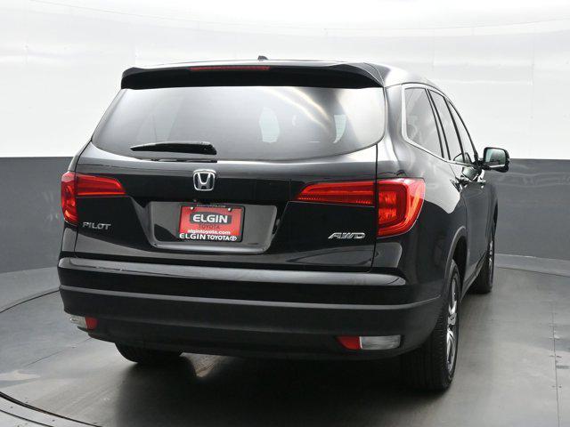 Photo of 2016 Crystal Black Pearl Honda Pilot