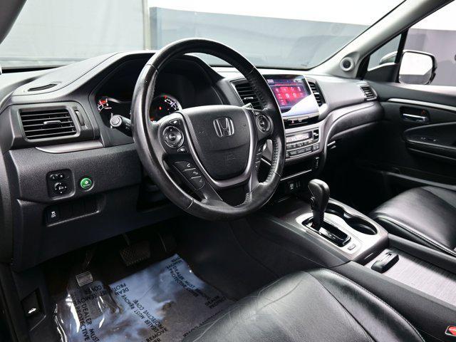 Photo of 2016 Crystal Black Pearl Honda Pilot