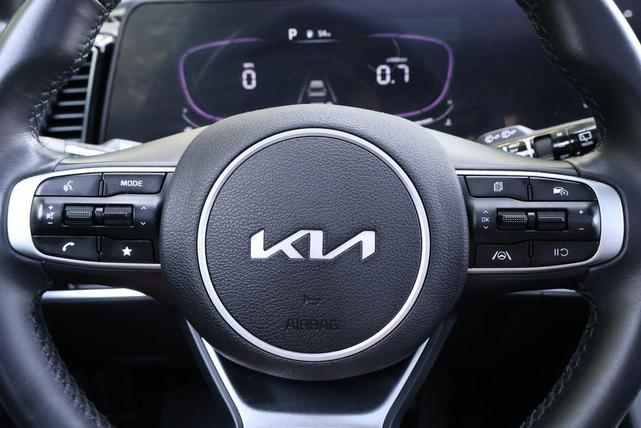 Photo of 2024 Sapphire Blue Kia Sportage