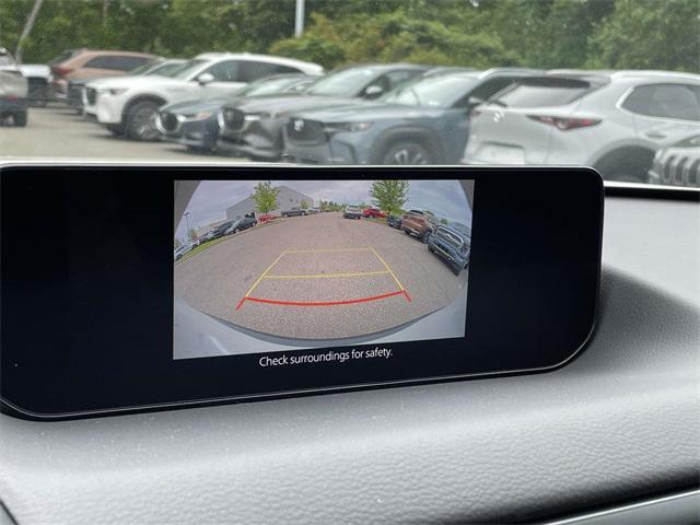 Photo of 2025 White Mazda CX-50 Hybrid