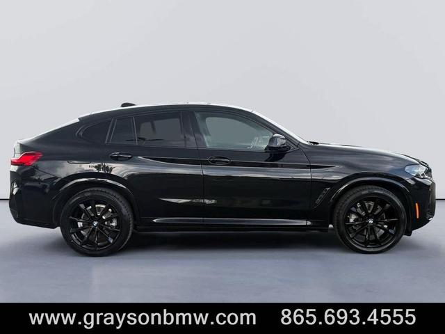 Photo of 2024 Black Sapphire Metallic BMW X4