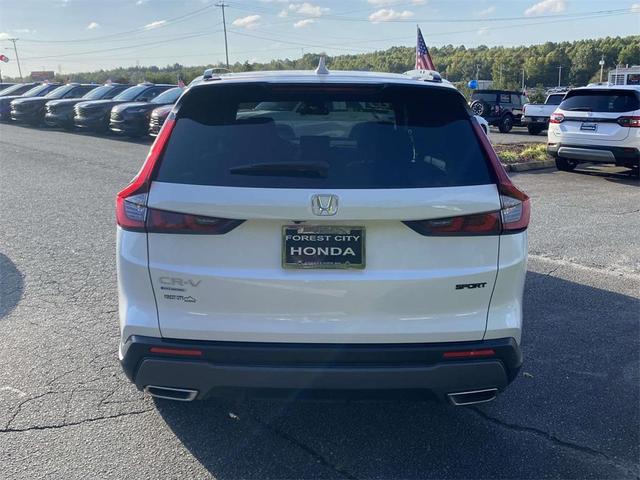 Photo of 2025 Platinum White Pearl Honda CR-V Hybrid