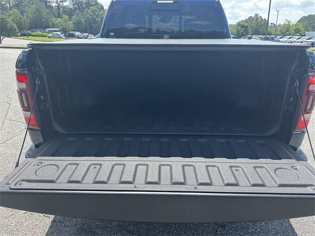 Photo of 2021 Patriot Blue Pearlcoat RAM 1500