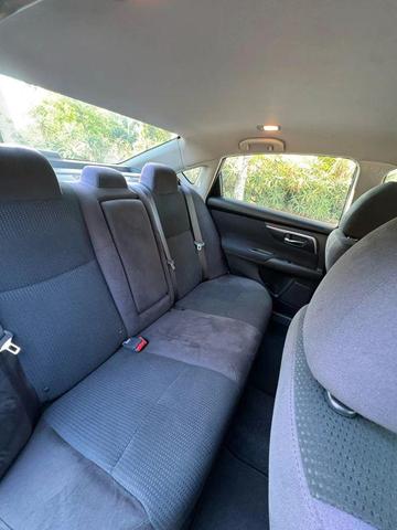 Photo of 2014 Super Black Nissan Altima