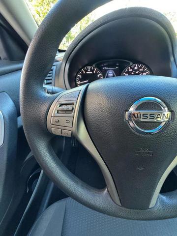Photo of 2014 Super Black Nissan Altima