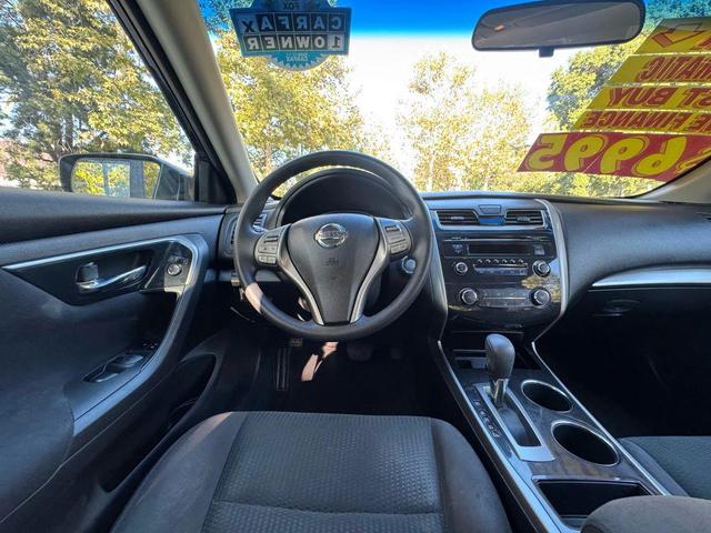 Photo of 2014 Super Black Nissan Altima