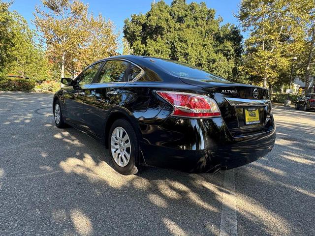 Photo of 2014 Super Black Nissan Altima