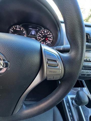 Photo of 2014 Super Black Nissan Altima