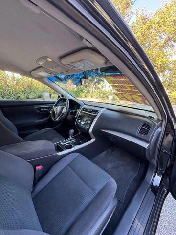 Photo of 2014 Super Black Nissan Altima