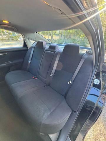 Photo of 2014 Super Black Nissan Altima