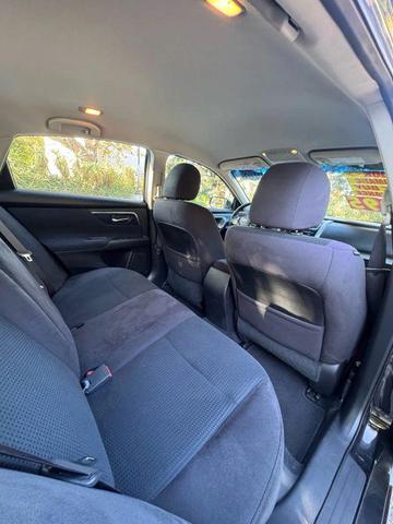 Photo of 2014 Super Black Nissan Altima