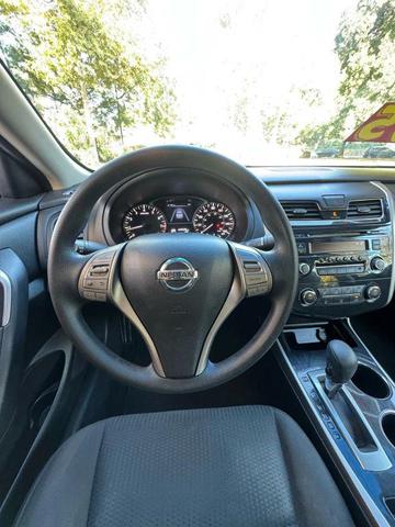 Photo of 2014 Super Black Nissan Altima