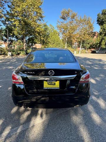Photo of 2014 Super Black Nissan Altima