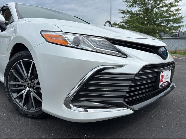 Photo of 2023 Wind Chill Pearl Toyota Camry Hybrid