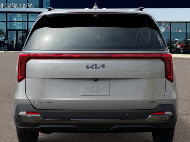 Photo of 2025 Ivory Silver Kia Carnival Hybrid