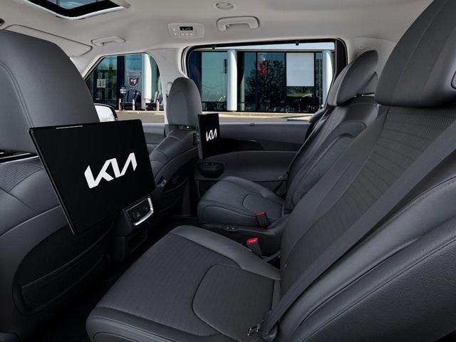 Photo of 2025 Ivory Silver Kia Carnival Hybrid