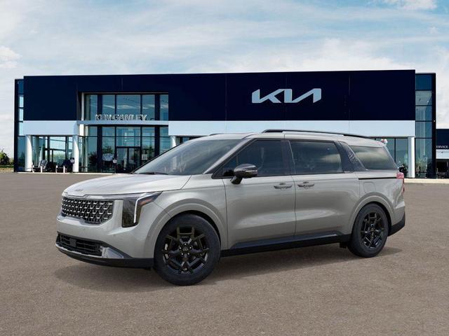 Photo of 2025 Ivory Silver Kia Carnival Hybrid