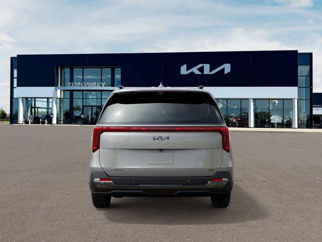 Photo of 2025 Ivory Silver Kia Carnival Hybrid
