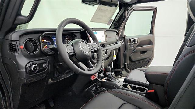 Photo of 2025 Granite Crystal Metallic Clearcoat Jeep Wrangler