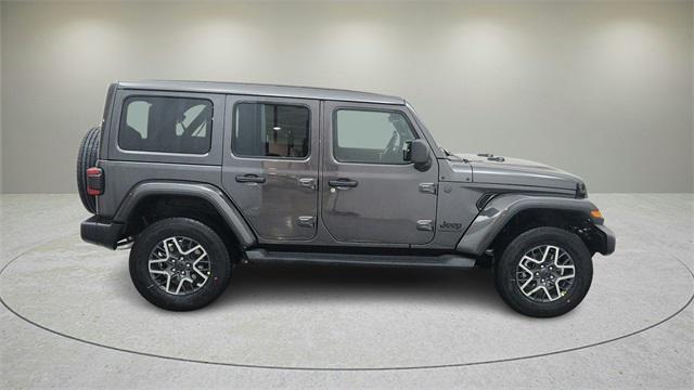 Photo of 2025 Granite Crystal Metallic Clearcoat Jeep Wrangler