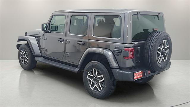 Photo of 2025 Granite Crystal Metallic Clearcoat Jeep Wrangler