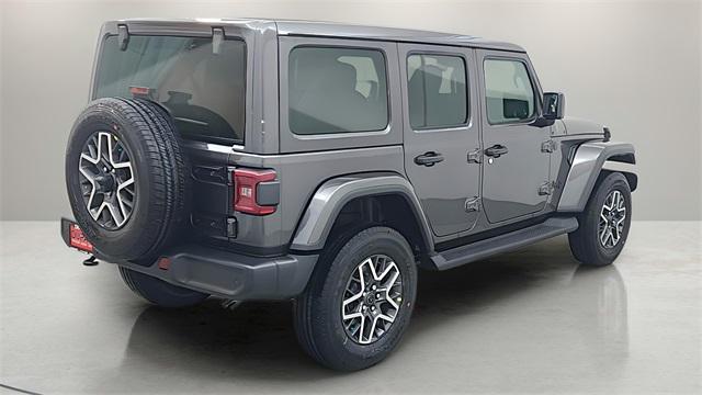 Photo of 2025 Granite Crystal Metallic Clearcoat Jeep Wrangler