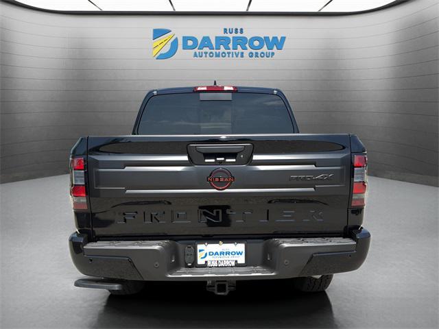 Photo of 2025 Super Black Nissan Frontier