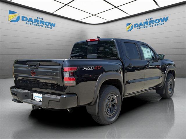 Photo of 2025 Super Black Nissan Frontier