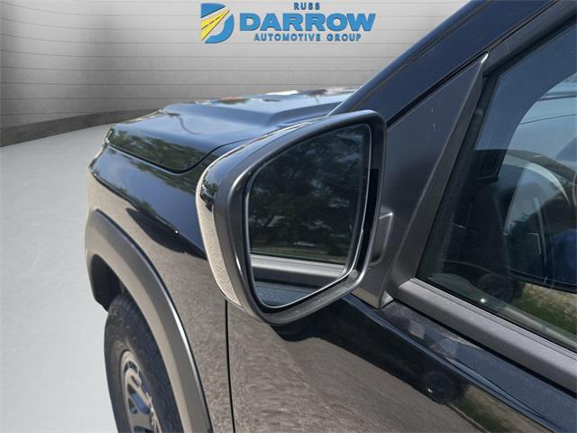 Photo of 2025 Super Black Nissan Frontier
