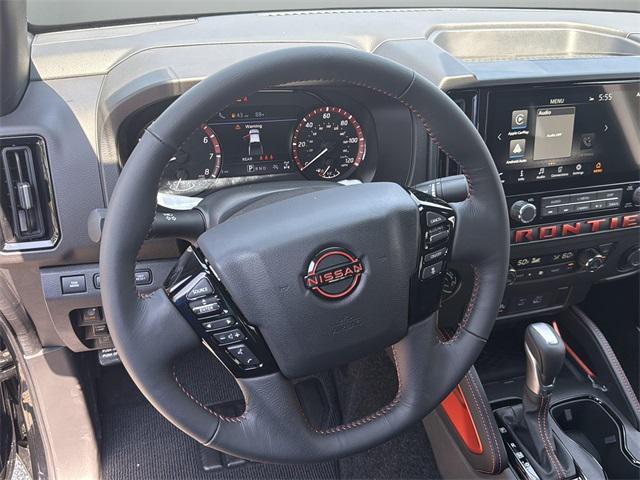 Photo of 2025 Super Black Nissan Frontier
