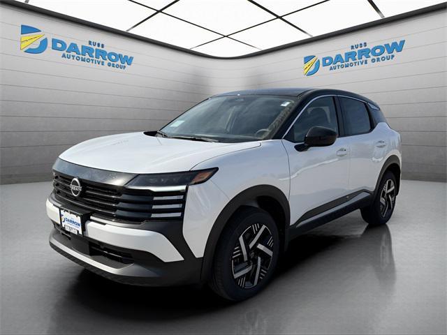 Photo of 2025 Aspen White Tricoat/Super Black Nissan Kicks