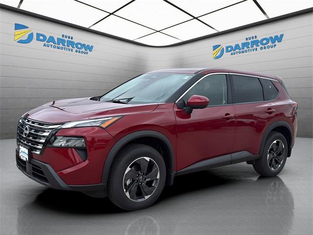 Photo of 2026 Scarlet Ember Tintcoat Nissan Rogue