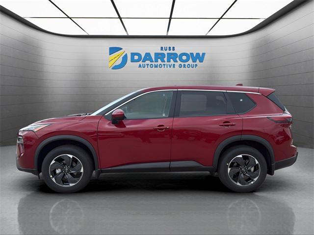 Photo of 2026 Scarlet Ember Tintcoat Nissan Rogue