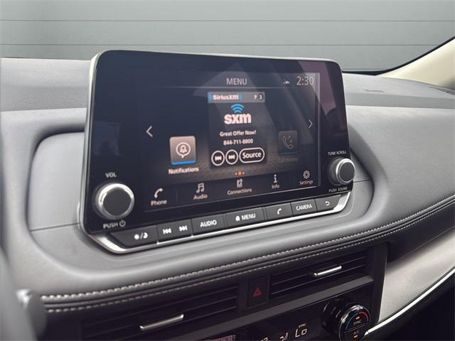 Photo of 2026 Scarlet Ember Tintcoat Nissan Rogue