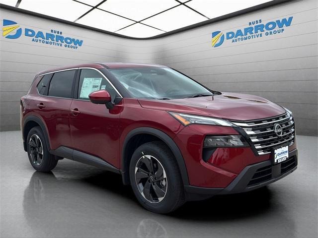 Photo of 2026 Scarlet Ember Tintcoat Nissan Rogue
