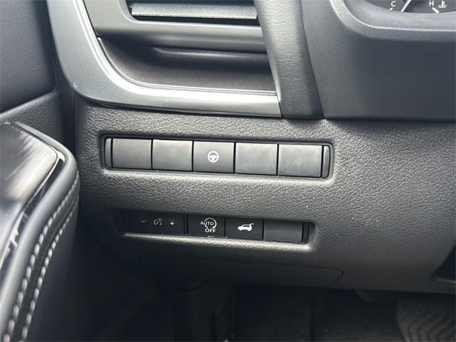 Photo of 2026 Scarlet Ember Tintcoat Nissan Rogue