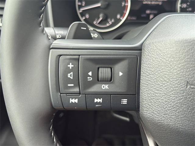 Photo of 2026 Scarlet Ember Tintcoat Nissan Rogue