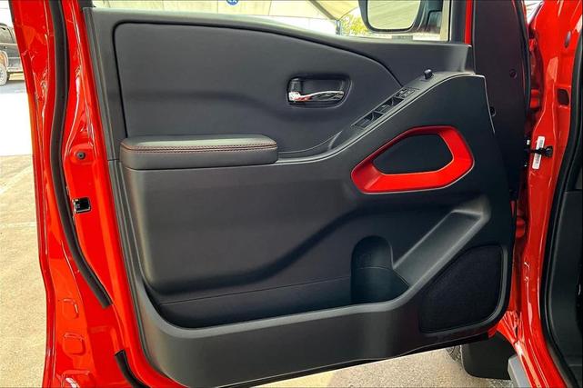 Photo of 2025 Afterburn Orange Nissan Frontier