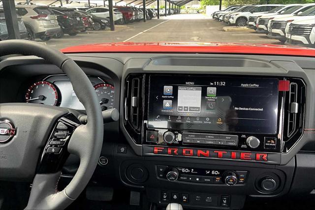 Photo of 2025 Afterburn Orange Nissan Frontier