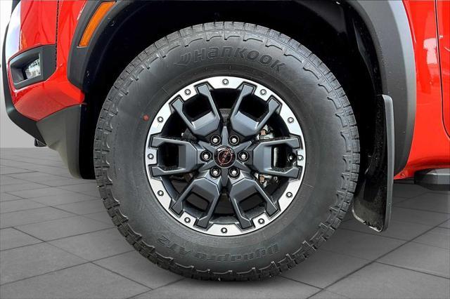 Photo of 2025 Afterburn Orange Nissan Frontier