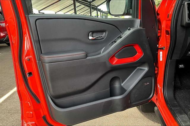 Photo of 2025 Afterburn Orange Nissan Frontier